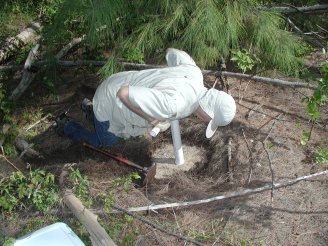 Taking a core sample on land